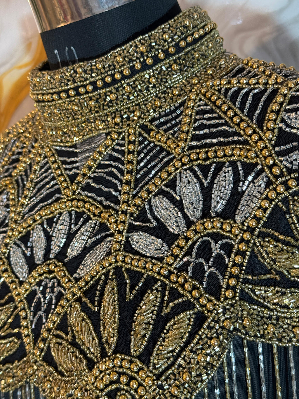 Handcrafted black-golden beaded cape poncho, beadwork geometric pattern, elegant cover-ups for special occations.