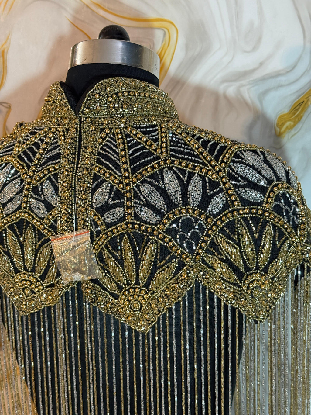 Handcrafted black-golden beaded cape poncho, beadwork geometric pattern, elegant cover-ups for special occations.