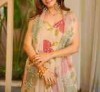 Cream organza silk plazzo suit set is adorned with colorful brush prints with sequence work