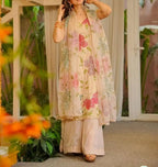 Cream organza silk plazzo suit set is adorned with colorful brush prints with sequence work